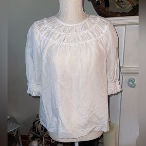 GO by GO SILK super cute baby doll shirt. (Smockingly blouse) Size XS NWT